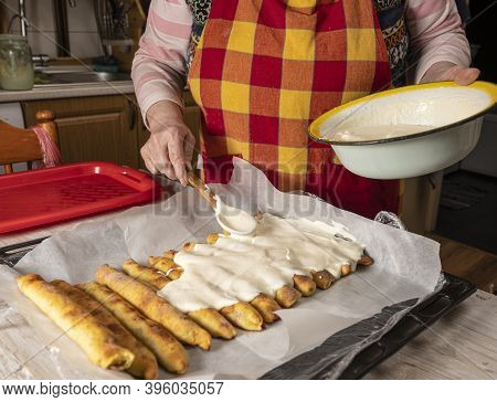 Woman Preparing Cherry Pie With Sour Cream At Home