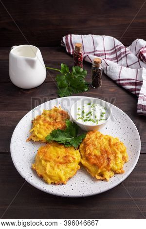 Fried Cakes Of Grated Potatoes On The Plate With Sauce. Traditional Pancakes Boxty Raggmunk.