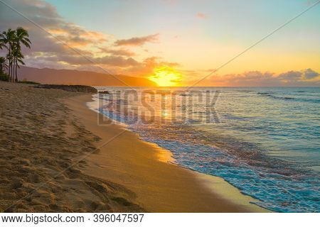 Beautiful Colorful Tropical Hawaiian Sunset Or Sunrise On Beach In Haleiwa, Oahu, Hawaii
