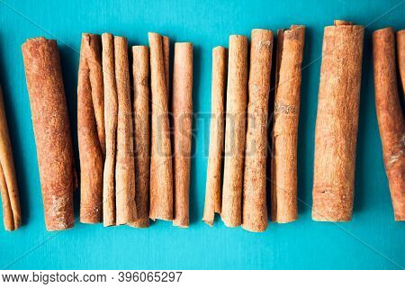 Cinnamon Sticks On The Turquois Background, Close Up