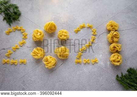 From Pasta, The Figures 2021 Are Laid Out From Shells, Bows, As Well As Yellow Peppers, Small Red To