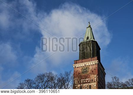 Cathedral In Turku, Finland Against A Blue Sky.