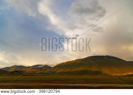 Dramatic mountain landscape near Castelluccio village in National Park Monte Sibillini, Umbria region, Italy