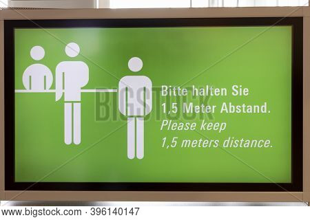 Frankfurt, Germany -july 11, 2020: Signage Keep Distance For 1,5 Meters At Frankfurt Airport Baggage