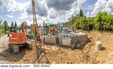 Fischbach, Germany - August 19, 2020: Construction Site Of A One Family House With Raw Bricks Withou
