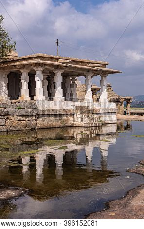 Hampi, Karnataka, India - November 4, 2013: Portrait Of Moola Virupaksha Temple With Its White Paint