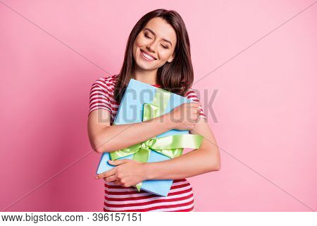 Photo Portrait Of Happy Birhtday Girl Hugging Embracing Wrapped Present With Closed Eyes Isolated On
