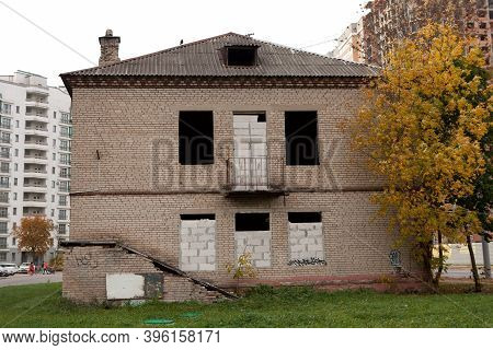Old Abandoned Brick Two-storey House With Walled Up Windows In The Center Of The City. 06.10.2020. M