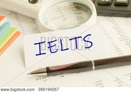 Paper With Word Ielts On A Table, Concept
