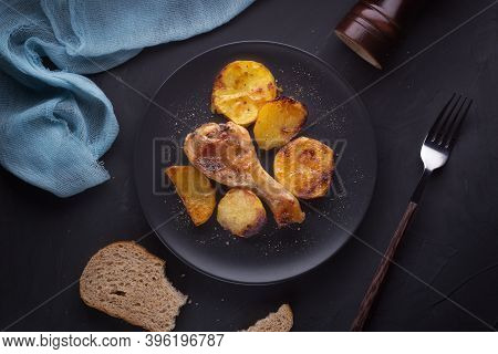 A dish of fragrant fried chicken with potatoes.