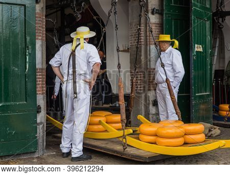 Alkmaar, Netherlands - April 28, 2017: Cheese carriers at traditional cheese market.
