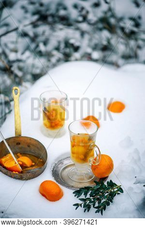 Mulled Wine With Sea Buckthorn And Mandrins In The Winter Garden Selective Focus