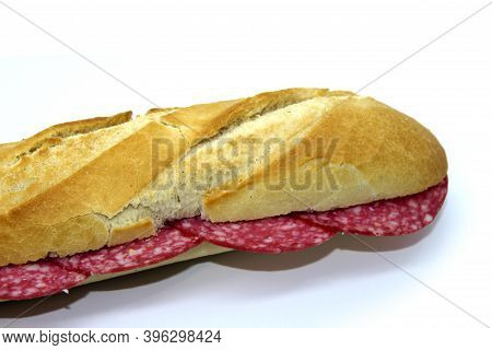 Salami Sandwich Om Baguette, Typical Italian Spiced Sausage On Spanish Pitufo Bread Mollete