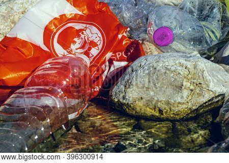 Atina,frosinone,lazio,italy-january 10,2020:plastic Bags And Bottles On The Riverbank,pollution Conc