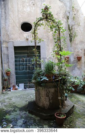 Romantic Well In A Public Courtyard In Orvieto. High Quality Photo
