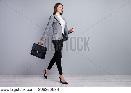 Full Body Profile Photo Of Attractive Lady Smiling Worker Young Promoted Chief Hold Diplomat Walking