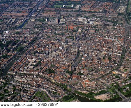 Groningen, Holland, July 12 - 1990: Historical aerial photo of Groningen with in the center the Martinitoren at the grote Markt, Holland