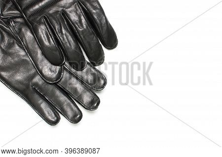Black Classic Leather Mens Gloves On White Isolated Background Top View. Stylish Fashionable Winter 