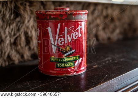 South Park City, Colorado - September 16, 2020: Old Antique Pipe And Tobacco Tin - Velvet Brand