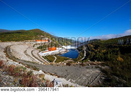 The Main Building Of The Kolyma Hydroelectric Power Station On The Kolyma River.