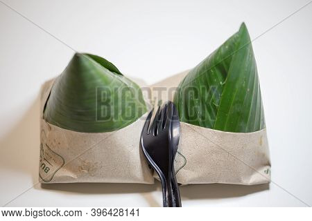 Shallow Depth Of Field Focus On Nasi Lemak Bungkus (packed Fragrance Rice) National Breakfast Dish O
