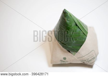 Shallow Depth Of Field Focus On Nasi Lemak Bungkus (packed Fragrance Rice) National Breakfast Dish O