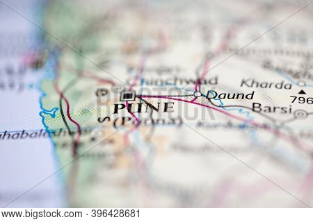 Shallow Depth Of Field Focus On Geographical Map Location Of Pune Poona India Asia Continent On Atla