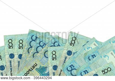 500 Kazakhstani Tenge Bills Lies On Bottom Side Of Screen Isolated On White Background With Copy Spa