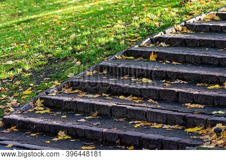 Stone Stairs With Steps Covered With Fallen Leave In City Park