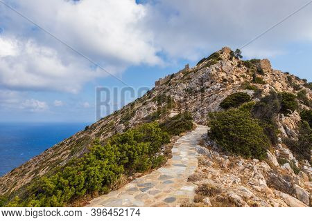 Stone Mountain Path To Palaiokastro, Ruins Byzantine Castle On The Top Of Hill. Ios Island, Greece.