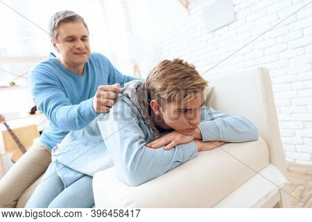 Father Tries To Talk To His Son, But Problem Teenager Doesn't Want To Listen, Turning Away.