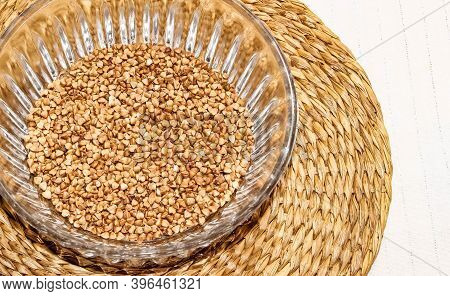 Dry Buckwheat In A Transparent Cup. The View From The Top.