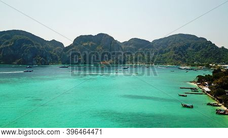 Turquoise Clear Water. Yachts, Boats Floating. Water Gradient From Light To Dark Blue. Phi Phi Don I