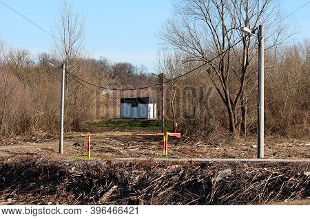 Access Road Leading Towards Small Industrial Water Pumping Station Control Room Blocked With Closed 