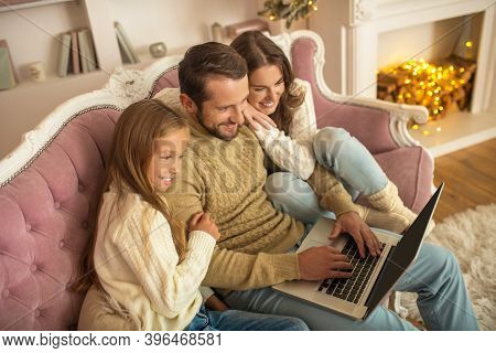 Young Family Spending Holdiday Togather And Looking Happy