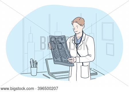 X-ray In Medicine And Surgery Concept. Man Doctor Therapist In Medical Uniform Standing, Holding And