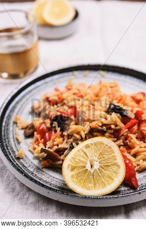 Arroz Con Verduras Y Azafran, Spanish Dish. Vegetarian Risotto With  Vegetables, Champignons And Saf