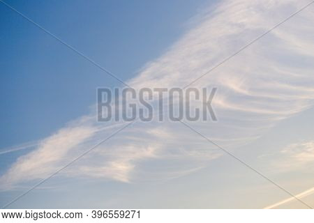Cirrocumulus Clouds In The Light Blue Sky Background