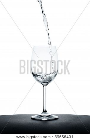 Pouring Water Into Wine Glass