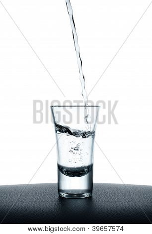 Pouring Water Into Glass