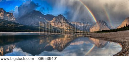 Beautiful Panoramic View Of American Rocky Mountain Landscape. Dramatic Sunrise Sky With Rainbow. Ar