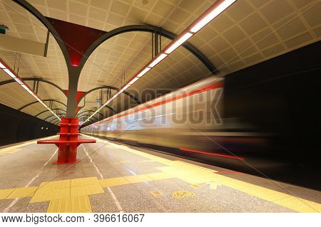 Motin Blured Metro Moving In A Station
