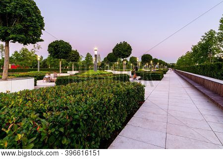 Maple Alley In French Garden In Public Landscape City Park Krasnodar Or Galitsky Park . Wooden Circu