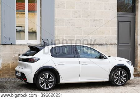 Bordeaux , Aquitaine  France - 11 21 2020 : New Peugeot 208 White Car Gt-line Side Street View