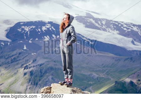 Happy Free Woman In Summer On Elbrus