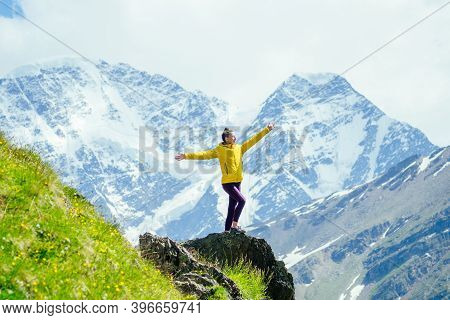 Happy Free Woman In Summer On Elbrus