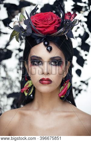 Pretty Brunette Woman With Rose Jewelry, Black And Red, Bright Make Up Kike A Vampire Closeup Red Li