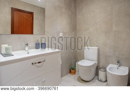 Small Clean And Tidy European Style Bathroom With A Bidet