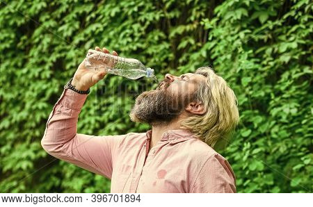 Drain The Bottle. Daily Intake Of Water. Thirsty Male Model Enjoying Refreshing Drink. Healthy Eatin
