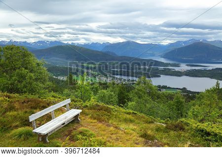 Norway Sunnmore District Landscape. View From Nihusen Mountain In Skodje Municipality. Bench With A 